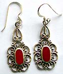 Butterfly pattern sterling silver earring with red carnelian stone embedded in middle