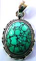 Sterling silver pendant with oval shape green turquoise stone embedded