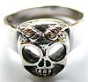 Sterling silver ring with skull motif (empty eye hole and wide mouth showing teeth)