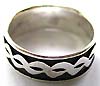 Black sterling silver ring with twisted knot pattern