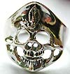 Sterling silver ring with cut-out religious skull pattern in middle
