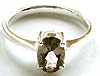 Sterling silver ring with light brown CZ set in middle