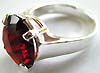 Sterling silver ring with rounded red garnet stone embedded in middle, different design and stone larger than than SNP-51
