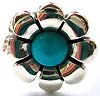Rounded turquoise stone embedded sun flower pattern sterling silver ring 