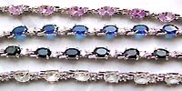 Multi horizontally placed oval shape clear / purple / black / blue color CZ along with multi mini rounded clear CZ forming fashion bracelet