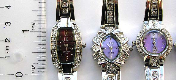 Fashion bracelet watch in assorted clock face design with multi mini cz stone embedded around