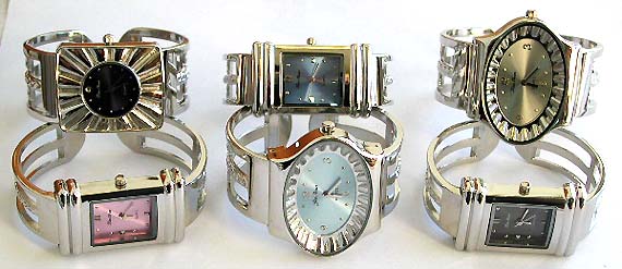 Double carved-out wide band fashion bangle watch with assorted clock face design