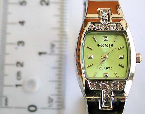 Fashion bangle watch with multi mini clear cz stone forming T shape pattern