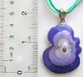 Fashion necklace in multi purple strings design with a purple enamel color beaded wavy heart love pendant