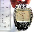 White or brown fashion bangle watch withpattern decor around clock face and on both sides, randomly pick
