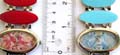 Elliptical clock face design fashion bracelet watch with 3 enamel color elliptical shape pattern decor on each side, assorted color randomly pick by our warehouse staffs 