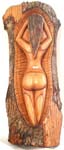 Tree stem with carved naked lady figure