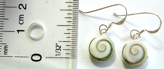 Artisan handcrafted silver jewelry with Shiva's Eye seashell in spiral pattern.    
