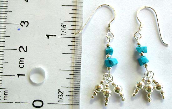Fish hook sterling silver earring with 2 blue turquoise beads and 3 mini silver bead st center and 3 beaded short strip on bottom       
