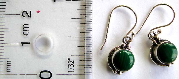 Fish hook sterling silver earring with rounded dark green turquoise stone inlay at center                
