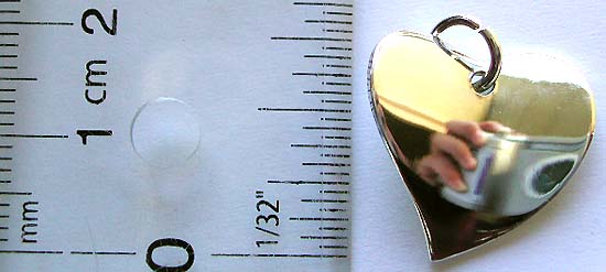 925. sterling silver pendant in curvy haert shape pattern design                  
