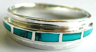 Carved-out long pattern sterling silver ring with 5 mini blue turquoise stone embedded at center



 
   