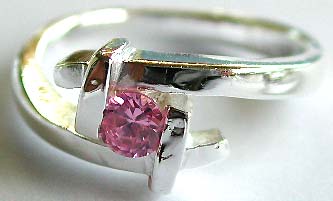 Costume jewelry silver wholesale central close knot pattern sterling silver ring with a mini pink color cz stone  

 
  



 
   