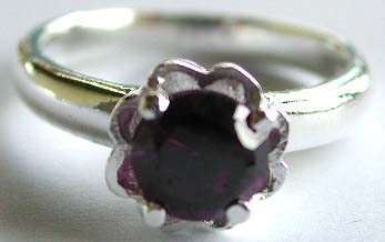 Sterling Silver Hallmark stamped Thailand sterling silver ring with a rounded amethyst cubic zirconia stone    

 
  



 
   