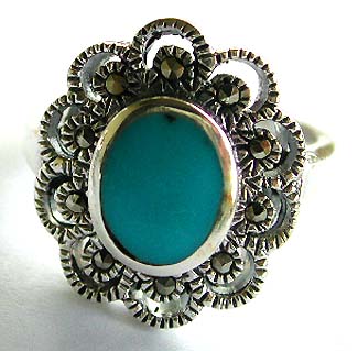 Wholesale turquoise jewelry and marcasite jewellery. An oval shape blue turquoise stone inlay sterling silver ring with multi marcasite stones 
