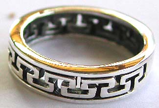 Girl jewelry in sterling silver. Girl's wedding band in carved-out mini puzzle pattern design