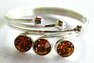Sterling silver toe ring in triple ring bang design with 3 orange color cz embedded at center                 
