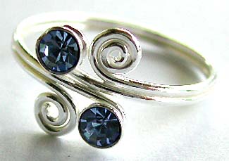 Sterling silver toe ring in double spiral pattern design holding 2 dark blue cz stone in middle                 
