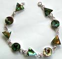 Sterling silver bracelet with multi triangular and rounded / triangular, rounded and sqaure shape abalone seashell inlaid