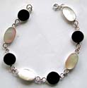 Sterling silver bracelet with multi diamond shape / rounded and elliptical shape mother of pearl seashell and black onyx stone inlaid