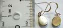 Fish hook sterling silver earring with an oval shape white mother of pearl seashell suspending