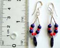 Rounded dark blue and red beads inlay loop shape pattern design sterling silver earring with a leaf pattern on bottom and fish hook for closure