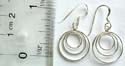 Carved-out triple circle design fish hook sterling silver earring