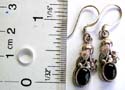 Rose flower pattern decor 925. sterling silver earring with an oval shape black onyx stone and fish hook for closure