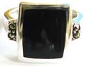 Sterling silver ring with a rectangular shape black onyx stone embedded in middle and two marcasite stones on both sides