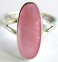 Sterling silver ring with carved-out V shape pattern holding an elliptical shape pink mother of pearl seashell in middle