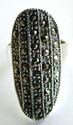 Sterling silver ring with multi marcasite stone embedded carved-out long shield pattern decor at center
