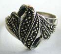 Multi marcasite stone embedded carved-out knot loop pattern decor 925. sterling silver ring