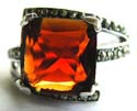 A square shape orange cz stone inlay sterling silver ring with multi marcasite stone embedded carved-out line pattern decor at center