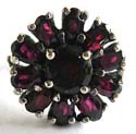 Sterling silver ring with multi red garnet stone forming flower pattern decor at center