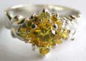 Sterling silver ring with multi yellow cz stone forming flower pattern decor at center