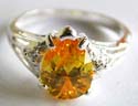 A water-drop shape yellow cz stone inlay 925. sterling silver ring with carved-out pattern on both sides