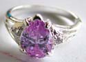 A water-drop shape light purple cz stone inlay 925. sterling silver ring with carved-out pattern on both sides