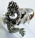925. sterling silver ring with carved-out flying dragon pattern decor at center