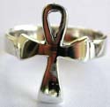 Sterling silver ring with carved-out loop top cross pattern decor at center