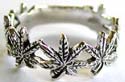 925. sterling silver ring with multi carved-out maple leaf pattern decor around 