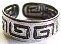 Sterling silver toe ring with carved-in black puzzle pattern decor around 