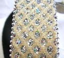 Yellow fashion belt with beaded edge and shiny piece chip decor along