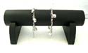 Black leather single display bar with stand, good fro bracelet, bangle and watch display