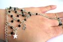 Fashion slave bracelet with multi diamond shape black rhinestones embedded and multi silvery stars or apples pattern decor