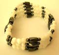 One string forming fashion hematite bracelet with multi rounded white cat eye stones and faceted cylinder shape magnetic hematite beads inlaid